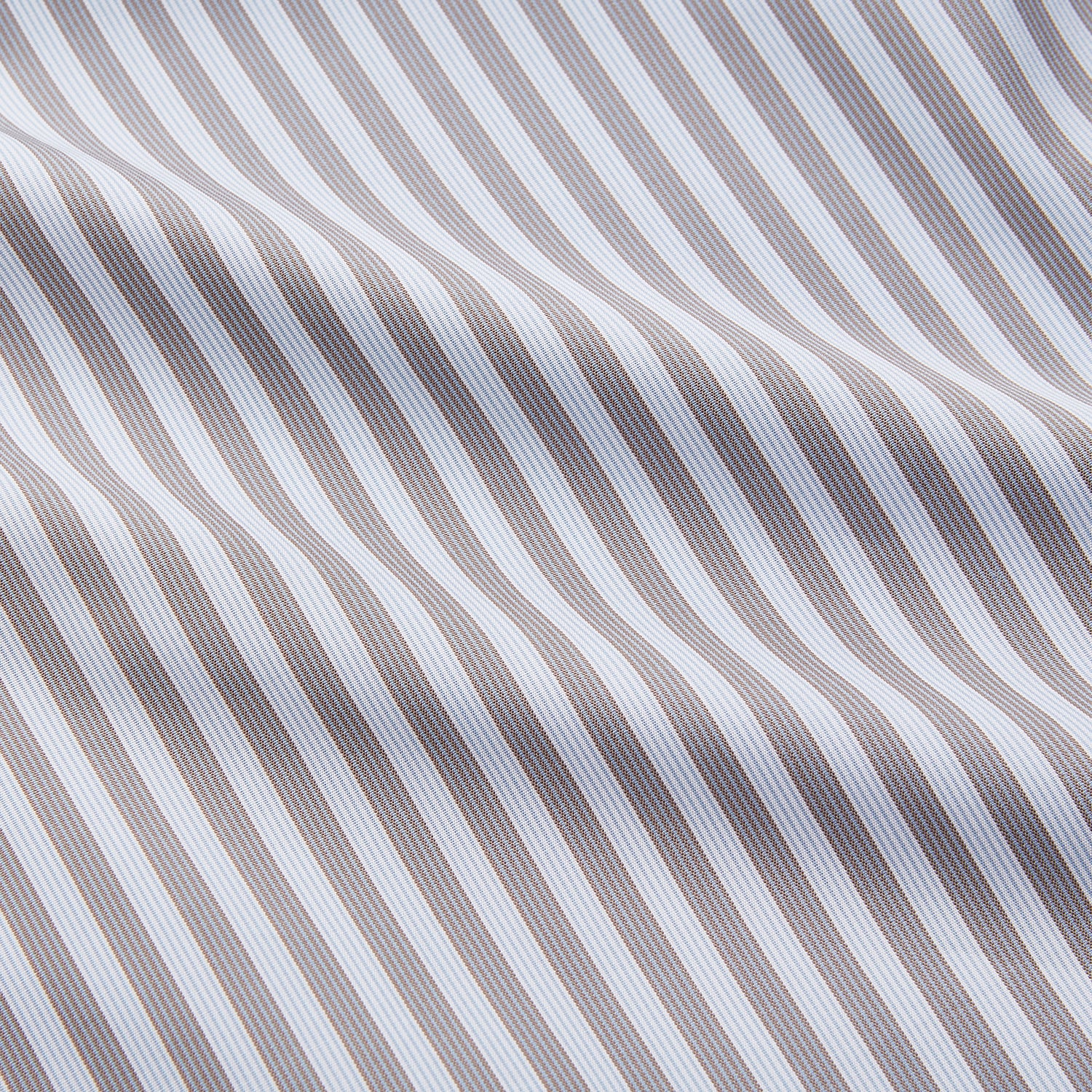 View 3 of product The Turnbull & Asser Pale Blue Multi Stripe Cotton Quin Pyjamas, featuring a long-sleeve button-up top and matching adjustable tie-waist pants, are neatly arranged on a white background.