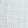 View 4 of product The Turnbull & Asser Dark Green Grid Check Mayfair Shirt features a white base with blue and dark green checks, a classic T&A collar, buttoned cuffs, and a Mayfair fit. The long-sleeve shirt is shown laid flat on a white background.