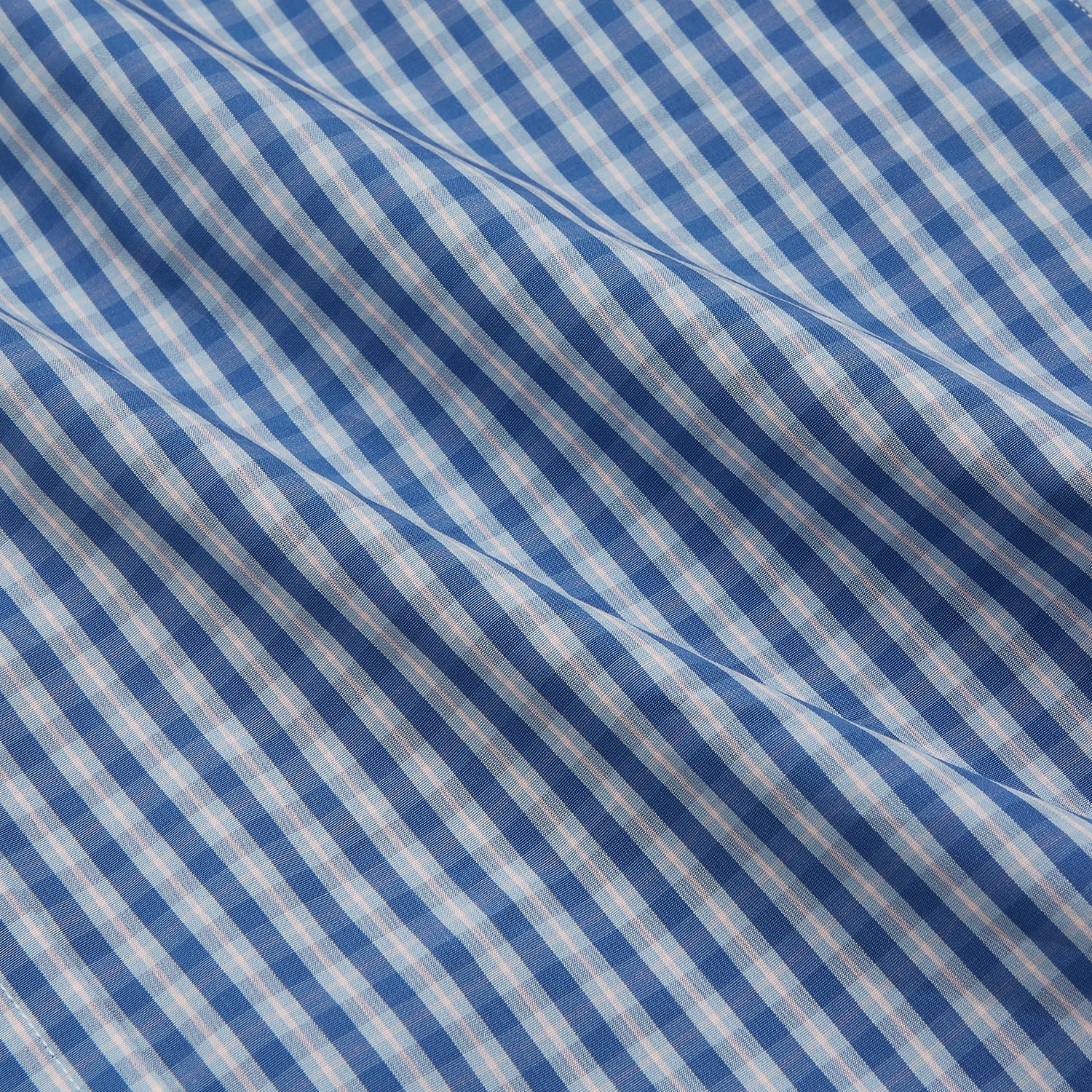 View 4 of product The Turnbull & Asser Navy Multi Check Cotton Regular Fit Mayfair Shirt features long sleeves, button-down front, collar, and buttoned cuffs in a navy and white check pattern, shown against a plain white background.