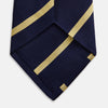 View 4 of product The Turnbull & Asser BLAZER STRIPE NAVY LEO TIE features classic navy with diagonal yellow stripes—an essential accessory to elevate any smart outfit.