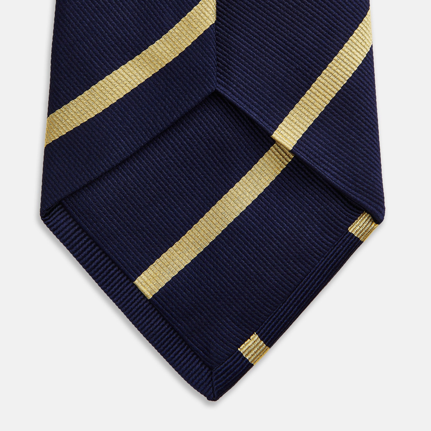 View 4 of product The Turnbull & Asser BLAZER STRIPE NAVY LEO TIE features classic navy with diagonal yellow stripes—an essential accessory to elevate any smart outfit.