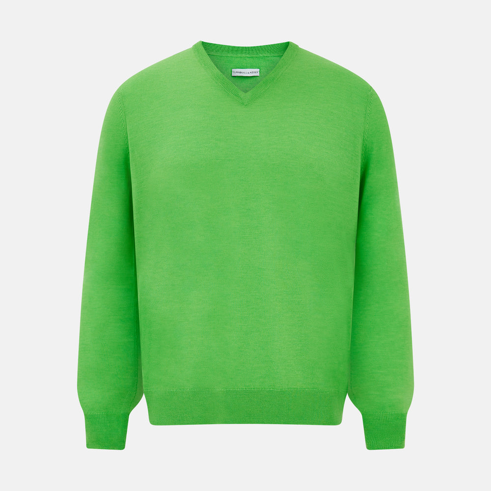 The Turnbull & Asser Lime Green Fine Merino V-Neck Jumper features ribbed cuffs and hem—a vibrant, standout knitwear choice for any wardrobe.