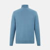 View 3 of product Turnbull & Asser's Pale Blue Fine Merino High Neck Jumper is shown on a plain white background, featuring a simple, classic design with long sleeves and no visible patterns or embellishments.