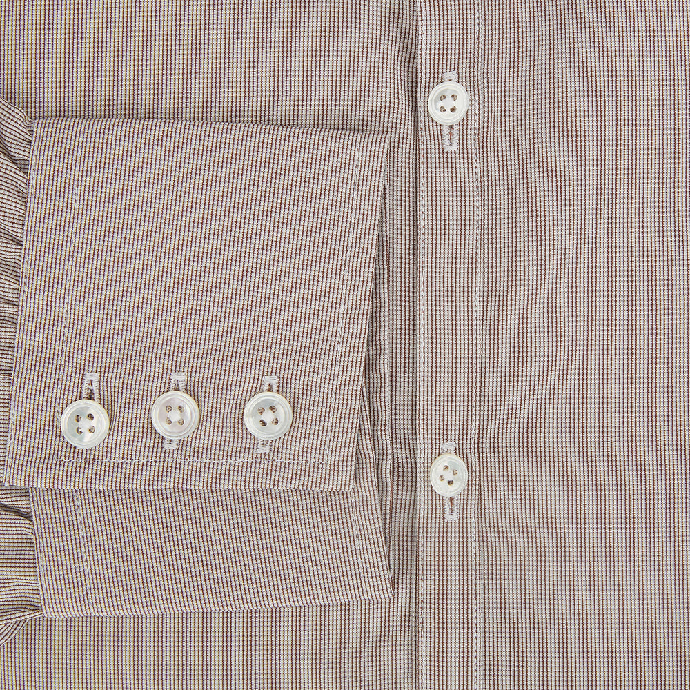 The Turnbull & Asser Brown Micro Graph Check Westminster shirt features long sleeves, a pointed collar, and buttoned cuffs—showcasing British craftsmanship and displayed flat on a white background.