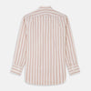 View 5 of product The Pink and Sandstone Stripe Cotton Regular Fit Mayfair Shirt by Turnbull & Asser features vertical pink and sandstone stripes on white, a T&A collar, wide cuffs, and a slightly curved hem for refined detail.