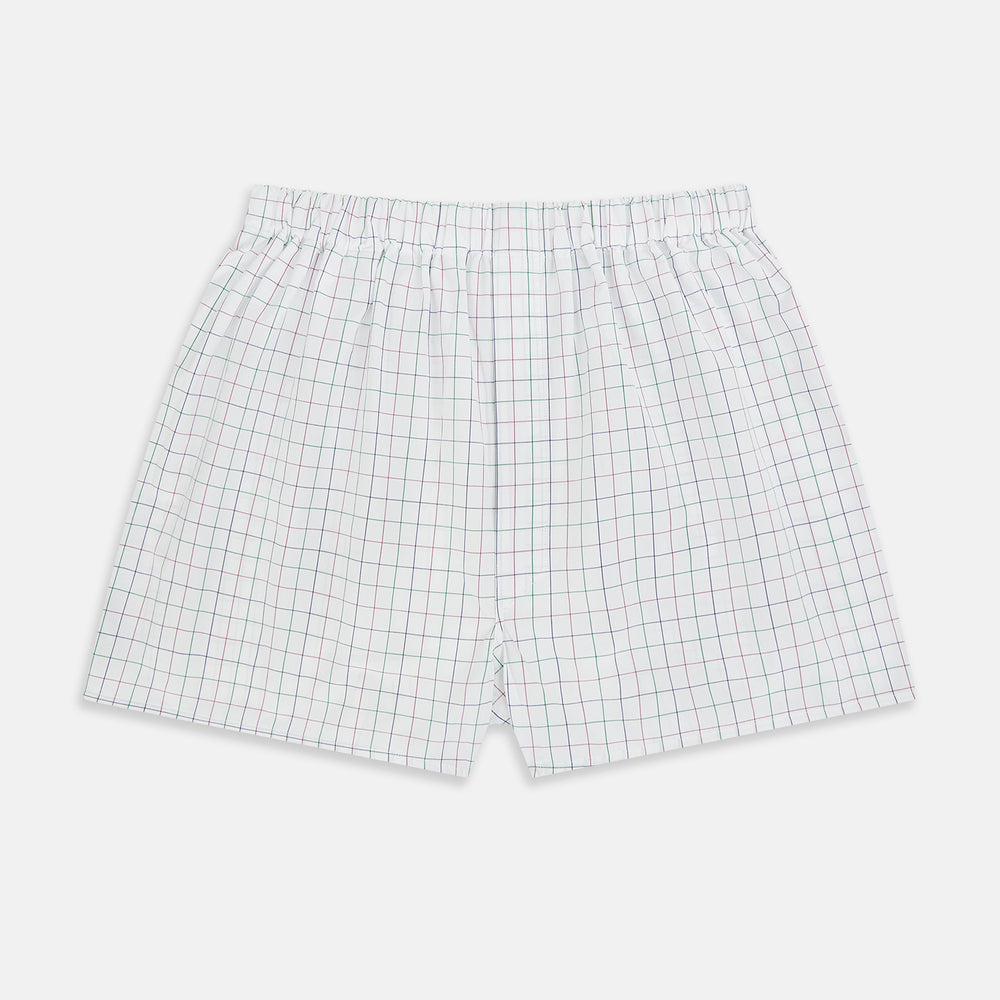 Turnbull & Asser Pink Grid Check Godfrey Boxer Shorts, crafted from Italian cotton with an elastic waistband, feature a pink grid pattern. The luxury boxer shorts are displayed flat against a plain white background.