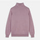 The Turnbull & Asser Lilac Heather Aubrey Cashmere Roll Neck Jumper features ribbed cuffs and hem—ideal for pairing with your favorite tailored trousers.