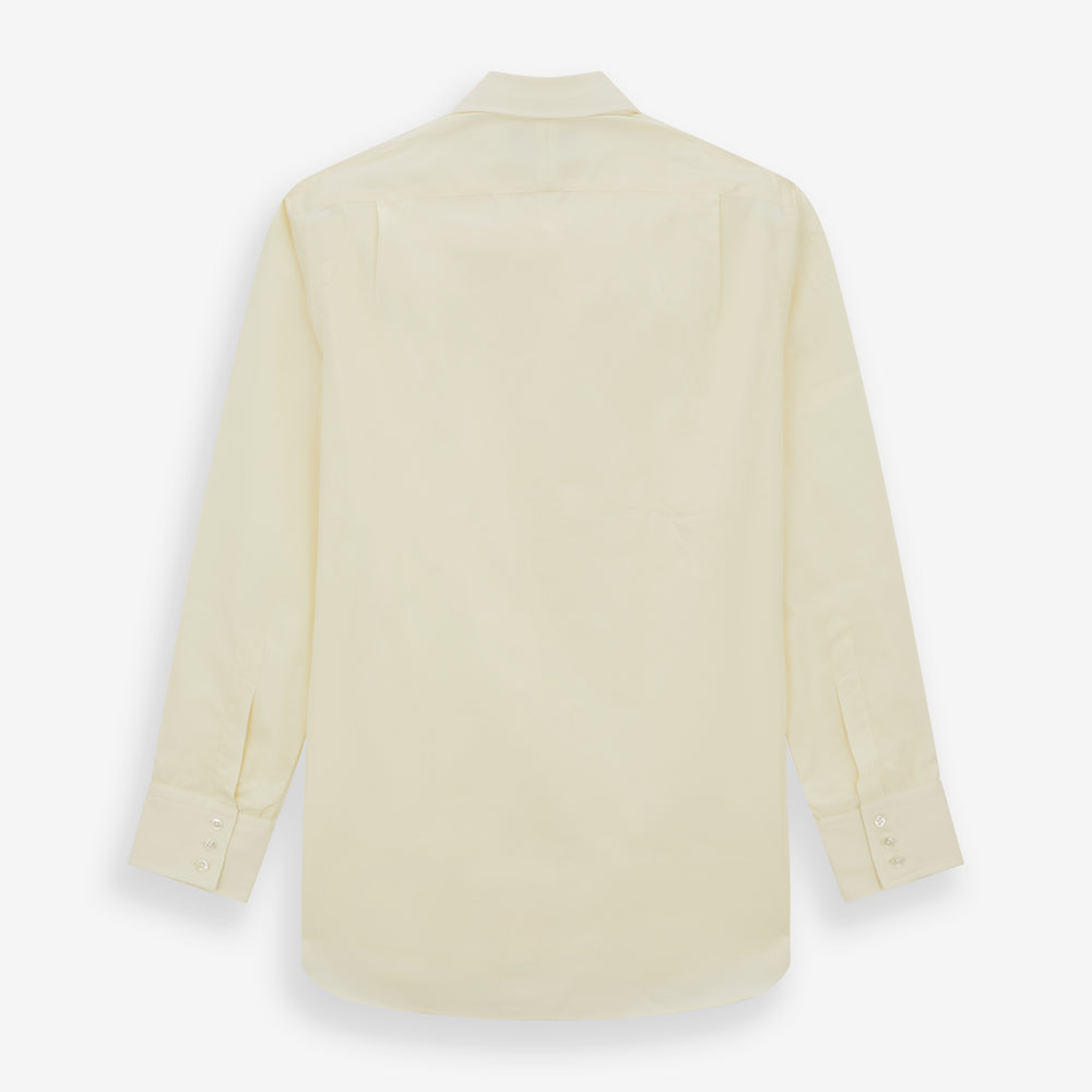 The Cream Cotton Shirt with T&A Collar and 3-Button Cuffs by Turnbull & Asser is ideal for minimalist styles or pairing with bold ties. Shown on a plain white background.