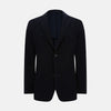 View 1 of product The Turnbull & Asser Navy Knitted Cambridge Blazer features a single-breasted design with three front patch pockets and two buttons, shown against a plain white background.