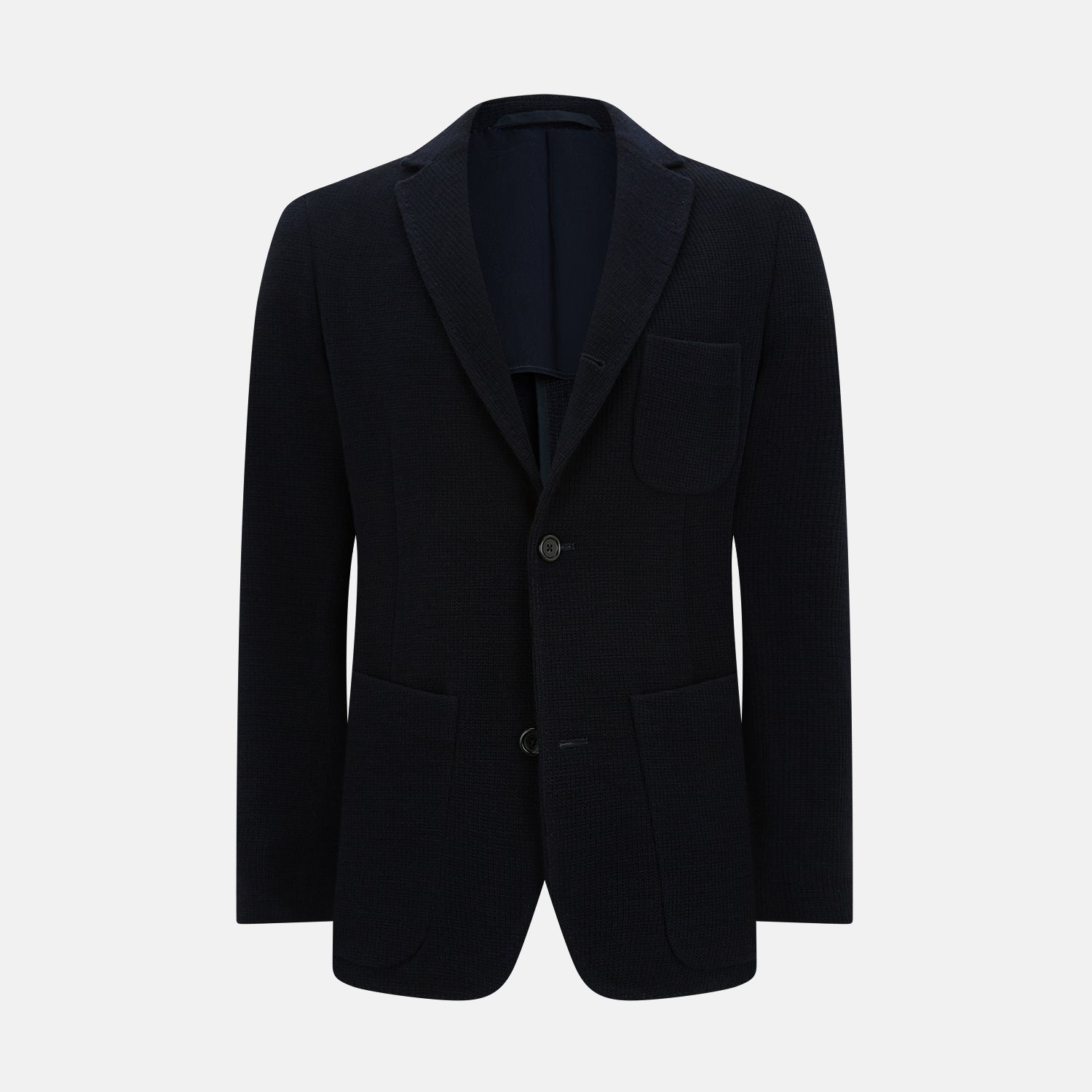 View 1 of product The Turnbull & Asser Navy Knitted Cambridge Blazer features a single-breasted design with three front patch pockets and two buttons, shown against a plain white background.