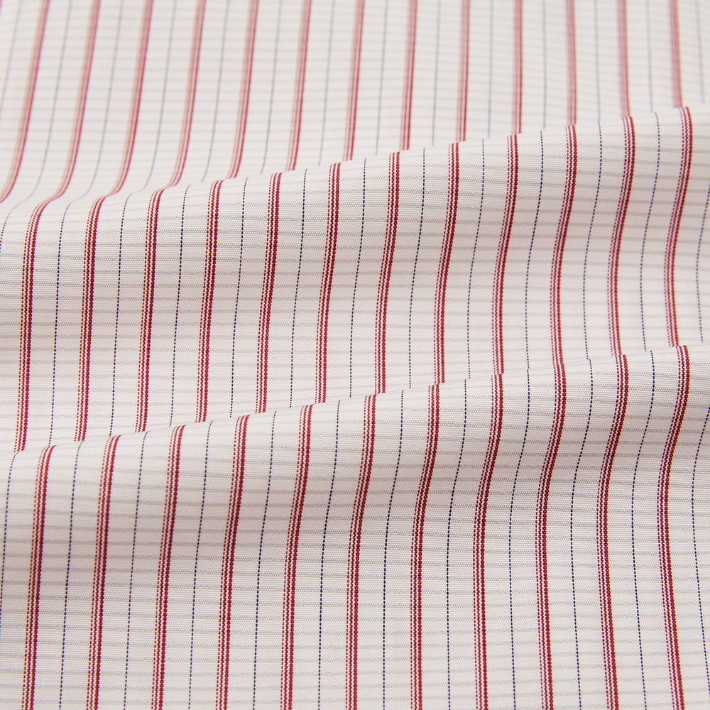 The Turnbull & Asser Red Graph Check Mayfair Shirt features a classic collar and buttoned cuffs, with red and blue stripes on white, ideal for formal wear. Laid flat on a white surface.