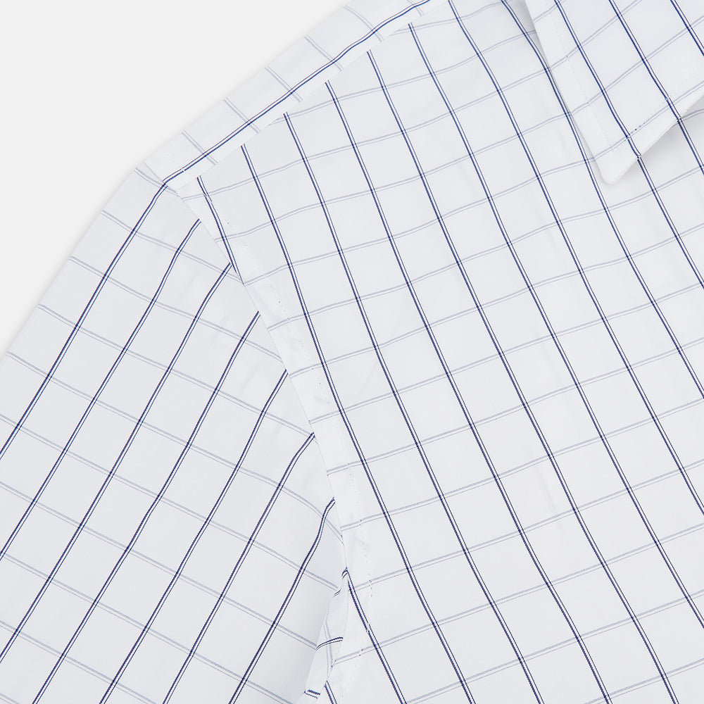 A Dark Navy Double-Line Checked Westminster Shirt by Turnbull & Asser, featuring button-down front, pointed collar, and buttoned cuffs—displaying British craftsmanship—laid flat on a white background.