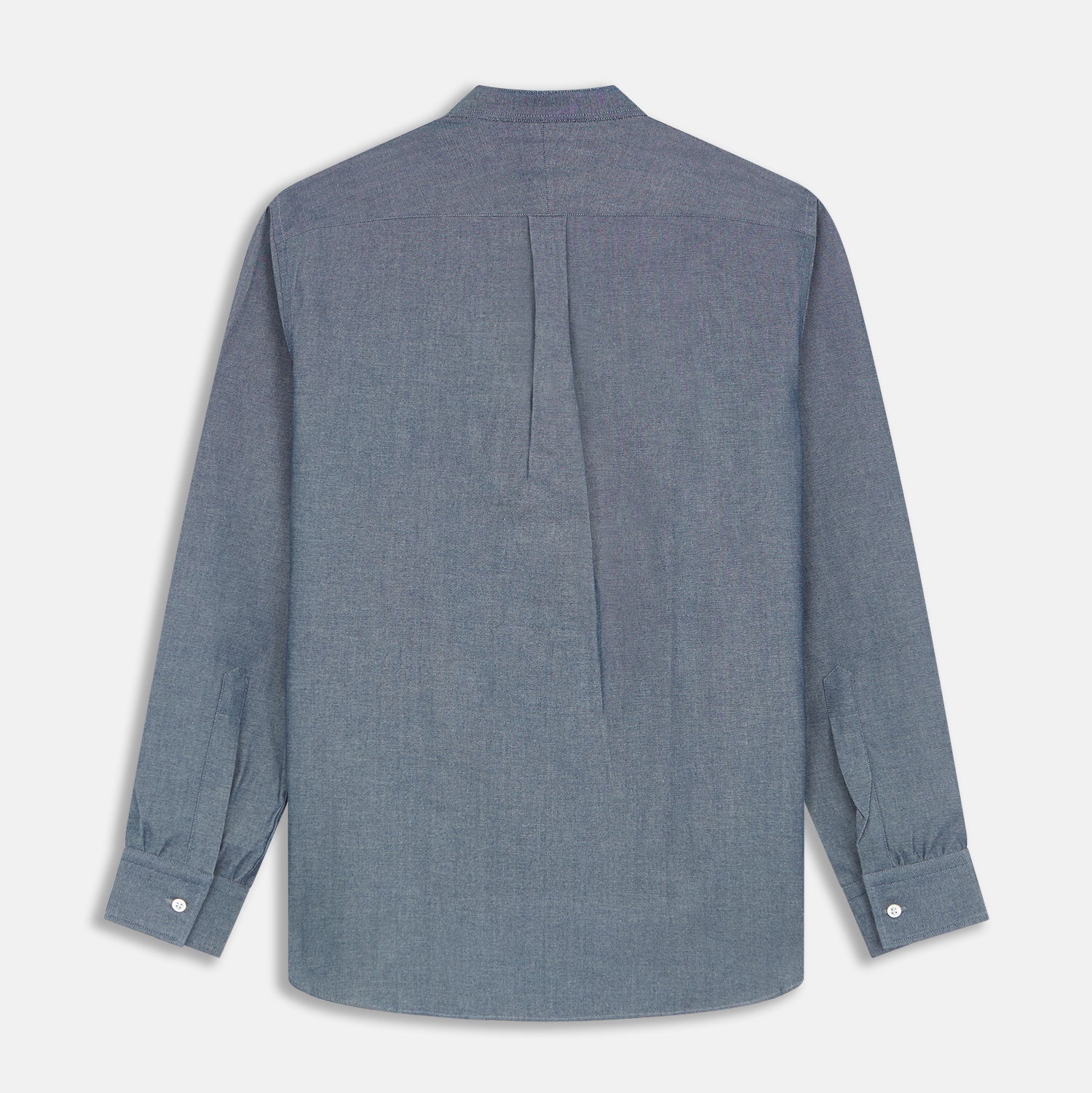 View 5 of product The Turnbull & Asser Plain Blue Oxford Cotton Weekend Fit Blake Shirt features long sleeves, a stand collar, and white buttons, displayed flat on a white background.