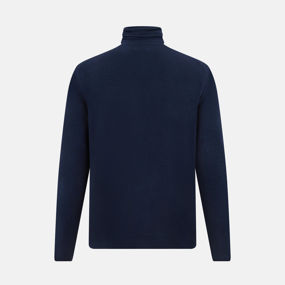 The Turnbull & Asser Navy Fine Merino High Neck Jumper, a plain long-sleeved piece crafted from premium merino wool, is shown on a white background.