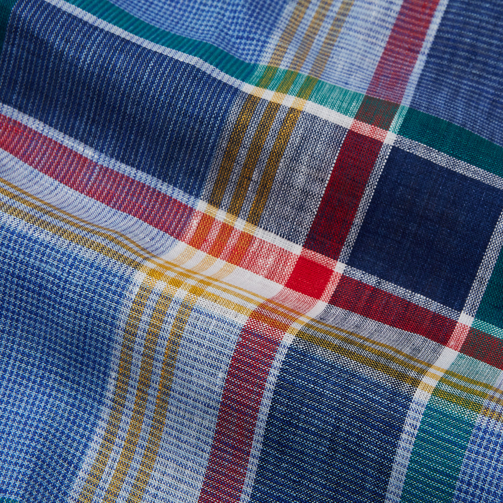 The Blue Multi Check Linen Weekend Fit Suffolk Shirt by Turnbull & Asser features a classic collar, white buttons, chest pocket, and colorful blue, green, yellow, red, and white plaid—perfect for a casual weekend look.
