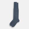 View 2 of product The Ash Dash Striped Long Sock by Turnbull & Asser—a single knee-high, dark blue over-the-calf sock with ribbed texture—is displayed on a plain, light background.