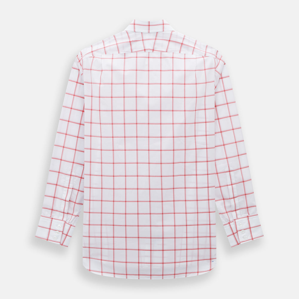 The Turnbull & Asser Coral Grid Check Mayfair Shirt is a white long-sleeve shirt with a collar, made from fine Italian cotton and featuring an evenly spaced coral grid check pattern.
