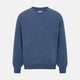 Turnbull & Asser’s Pacific Blue Cashmere V-Neck Jumper features ribbed cuffs, hem, and neckline, shown on a white background.