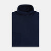 View 4 of product The Turnbull & Asser Navy Fine Merino High Neck Jumper, a plain long-sleeved piece crafted from premium merino wool, is shown on a white background.