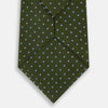 View 3 of product The Turnbull & Asser Green and Blue Micro Dot Silk Tie is shown rolled up, displaying small light blue dots on green silk against a plain white background.