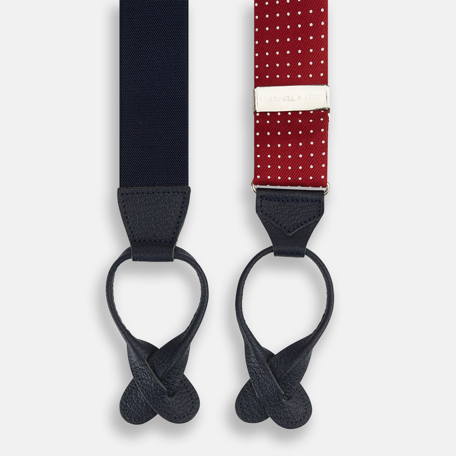 View 2 of product Turnbull & Asser’s Burgundy and White Small Spot Adjustable Silk and Navy Leather Braces feature white polka dots, navy leather loops, and M-shaped elastic straps—a refined statement for standout style.