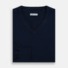 View 4 of product The Turnbull & Asser Navy Cashmere V-neck Jumper features long sleeves with ribbed cuffs and hem, shown against a white background.