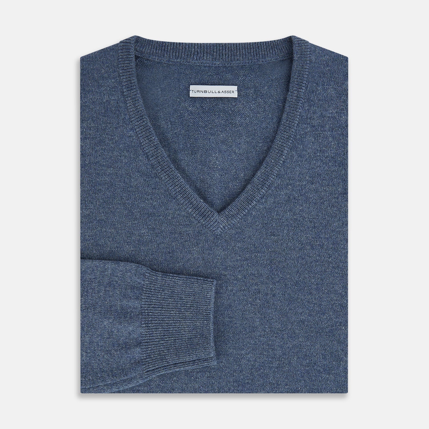 View 4 of product The Blue Melange Cashmere V-neck Jumper by Turnbull & Asser, featuring ribbed cuffs and hem, is part of our knitwear collection and shown against a white background.