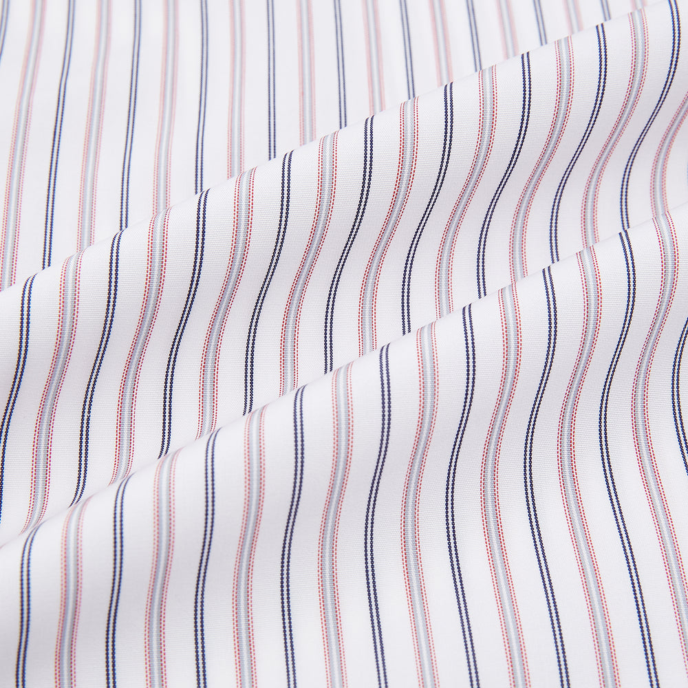The Turnbull & Asser Red Multi Stripe Mayfair Shirt is a long-sleeve, button-up classic with a sharp collar and vibrant red multi stripes—an essential men's piece shown against a white background.