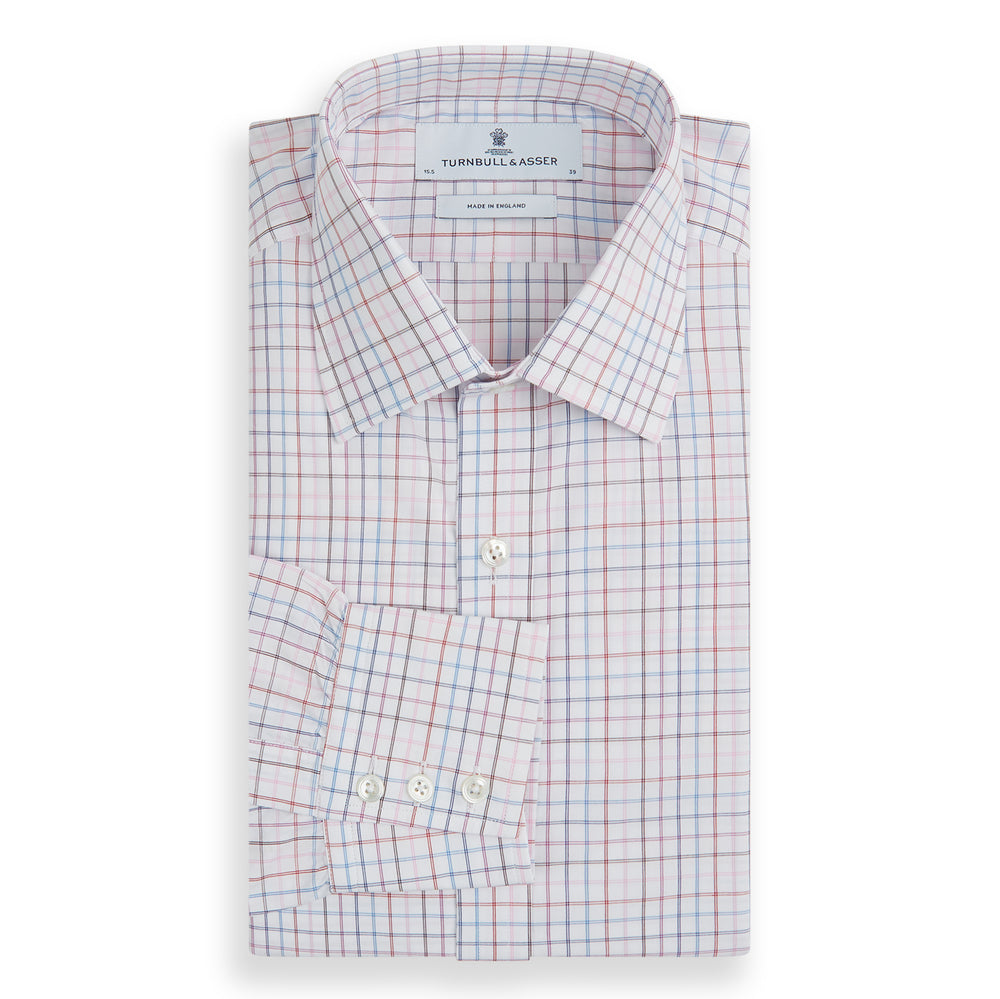 The Turnbull & Asser Pink Multi Double Grid Check Mayfair Shirt, made from organic cotton with a pointed collar and buttoned cuffs, features a light pink base with blue and red grid checks and is shown flat on a white background.