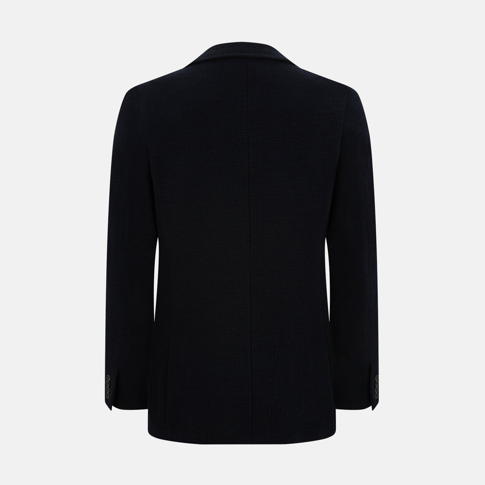 The Turnbull & Asser Navy Knitted Cambridge Blazer features a single-breasted design with three front patch pockets and two buttons, shown against a plain white background.