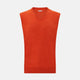 The Turnbull & Asser Red Orange Cashmere Sleeveless Vest with a V-neck, ribbed hem, and minimalist design is showcased against a white background—ideal for the refined gentleman.