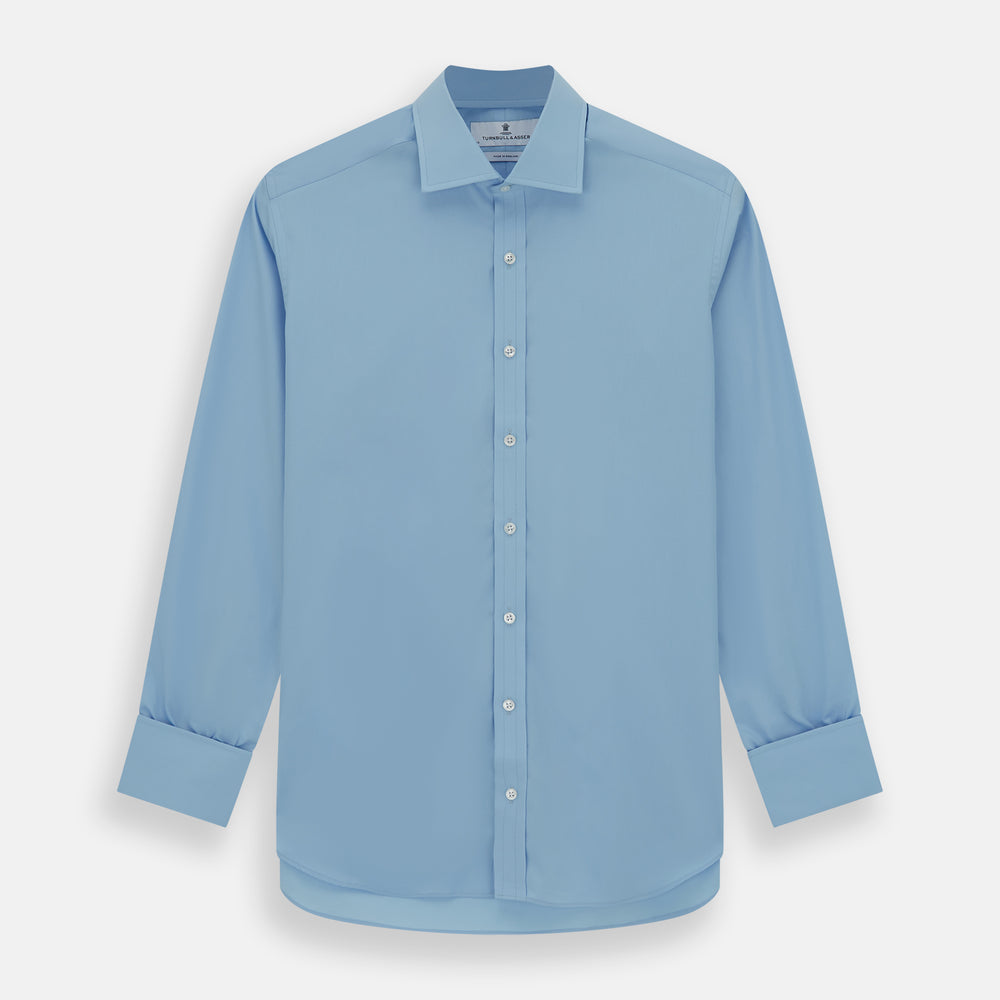 The Turnbull & Asser Dr. No Blue Cotton Shirt with a classic collar, cocktail cuffs, button-up front, and straight hem is featured on a plain white background. As seen on James Bond.