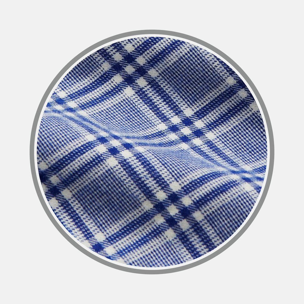 Close-up of Turnbull & Asser Blue Check Cotton Fabric, featuring a woven blue and white plaid pattern with intersecting lines and small white squares, displayed within a circular frame.
