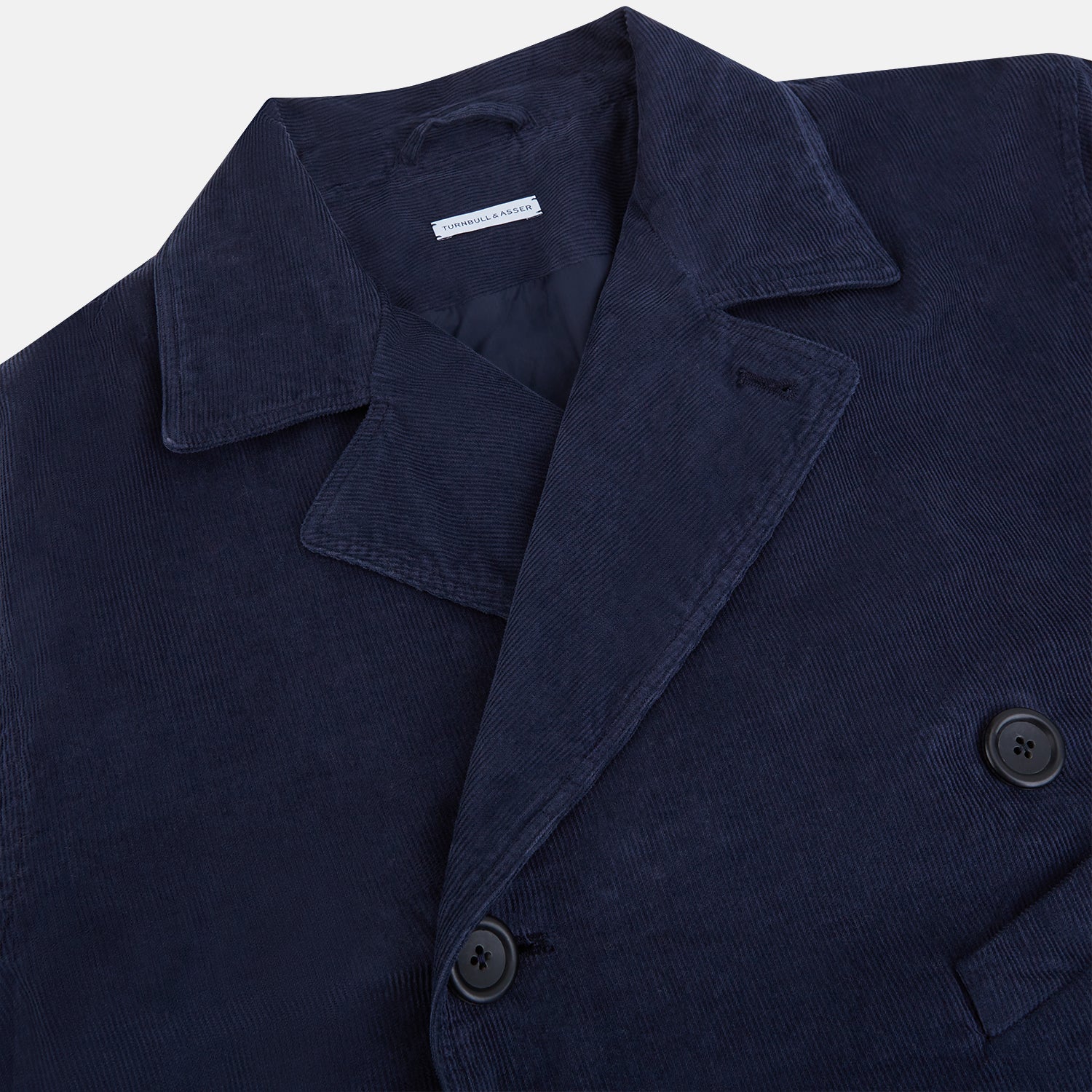 View 2 of product The Turnbull & Asser Light Navy Kingston Corduroy Caban Jacket features a double-breasted stretch cotton corduroy design with black buttons, notched collar, and long buttoned cuffs, displayed on a plain white background.