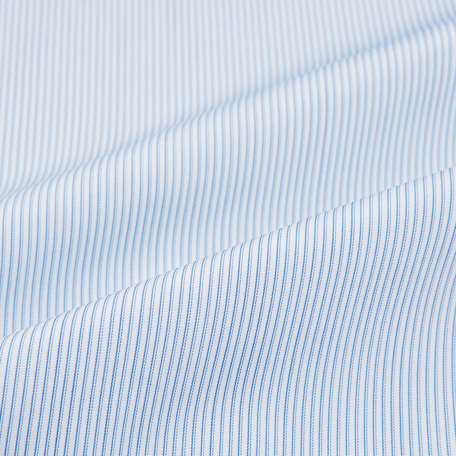 View 6 of product Turnbull & Asser Sky Blue Hairline Multi Stripe Shirt features a contrasting T&A collar and cuffs, long sleeves, and button-down front. Displayed against a plain white background.
