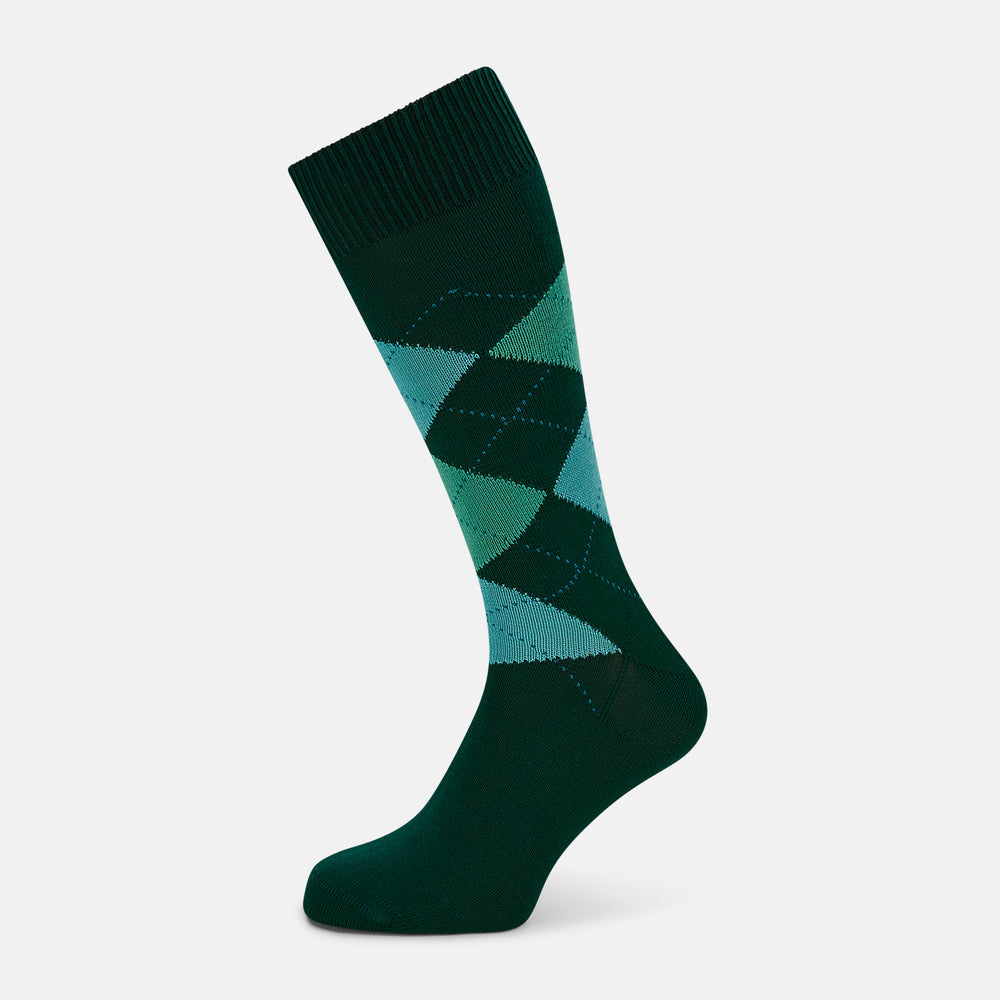 The Olive Check Mid-Length Socks by Turnbull & Asser, crafted from comfortable cotton in dark green with blue and light green argyle patterns, are shown on a plain white background—ideal for adding stylish flair to your sock collection.