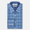 View 5 of product The Turnbull & Asser Colony Blue Grid Check Mayfair Shirt is a light blue, long-sleeve button-up with a collar and evenly spaced dark blue grid lines.