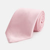 View 1 of product The Turnbull & Asser PINK PLAIN SATIN SILK TIE is neatly rolled and showcased against a plain white background.