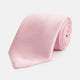 The Turnbull & Asser PINK PLAIN SATIN SILK TIE is neatly rolled and showcased against a plain white background.