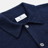 View 3 of product The Turnbull & Asser Navy Cashmere Duncan Knitted Shirt, a button-up with collar, long sleeves, chest pocket, and straight hem, is shown laid flat on a white background.