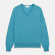 The Turquoise Kennedy Merino V-Neck Jumper by Turnbull & Asser features ribbed cuffs and hem, crafted from premium merino knitwear, and is shown flat on a white background.