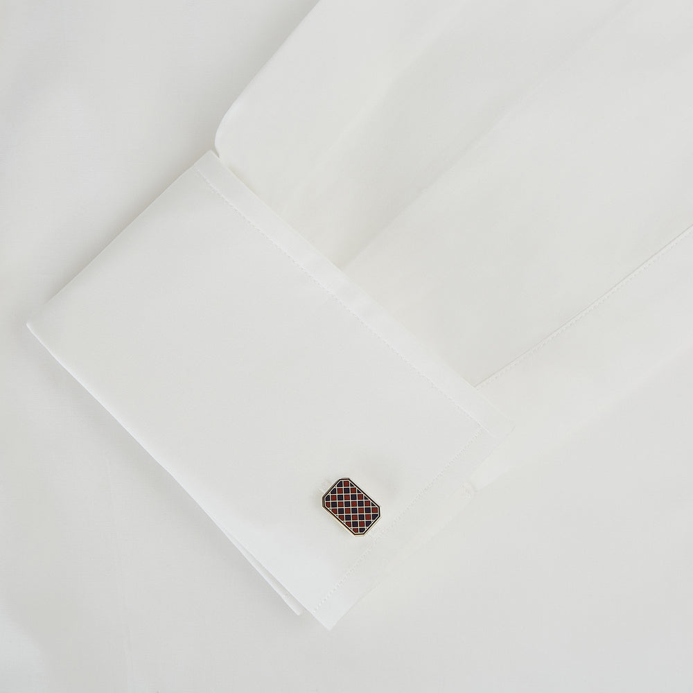 Turnbull & Asser Burgundy and Navy Checkered Rectangular Enamel Cufflinks boast a refined rectangular design with an enamel checkered pattern, reflecting artisanal mastery and timeless masculine elegance.