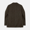 View 4 of product The Green Multi Check Cashmere Barrington Blazer by Turnbull & Asser, featuring a single-breasted design, notched lapel, and two front flap pockets, is shown laid flat on a white background.
