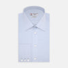 View 1 of product The Turnbull & Asser Two-Fold 120 Light Blue Shirt features a T&A collar, 3-button cuffs, white buttons, front pocket, and inner collar label. It is displayed neatly folded on a plain white background.