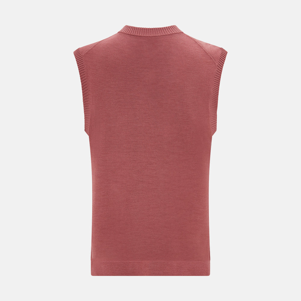 The Turnbull & Asser Antique Pink Fine Merino V-Neck Vest features ribbed trim at the neckline, armholes, and hem—a stylish layering piece for cooler seasons. Shown against a plain white background.