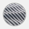 View 1 of product Close-up of Turnbull & Asser's Navy Multi Stripe Wool Fabric, featuring diagonal white stripes, displayed inside a circular frame on a light gray background.