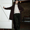View 2 of product The Burgundy Grayson Car Coat by Turnbull & Asser, made from a rain-resistant cotton blend with a collar, hidden front buttons, and slanted pockets, is displayed flat on a white background in a minimalist style.