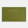 View 1 of product The Moss Green Slim Rounded Card Holder by Turnbull & Asser features Italian leather, white printed branding on the front, detailed stitching, and a curved seam at the upper right corner.