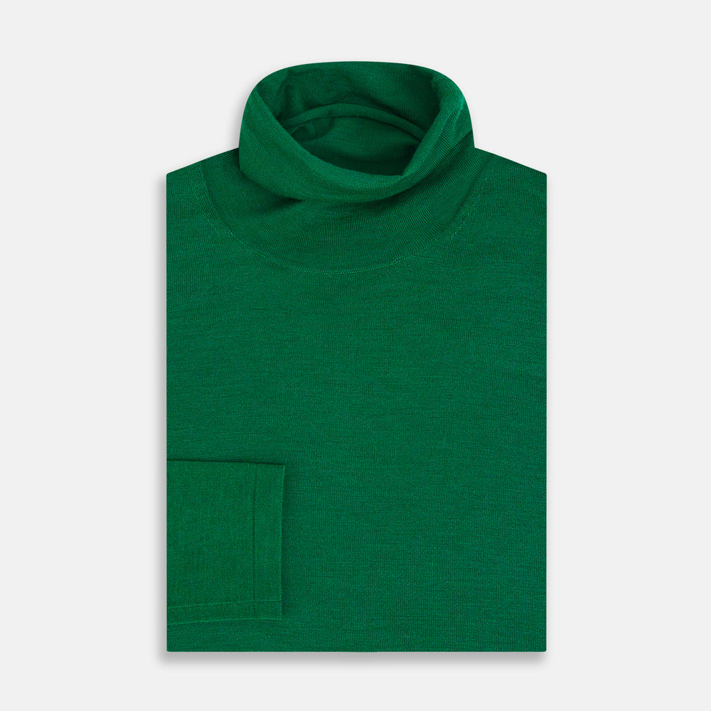 The Turnbull & Asser Hunter Green Fine Merino High Neck Jumper features a classic long-sleeve turtleneck style, crafted from soft merino wool and displayed against a crisp white background.