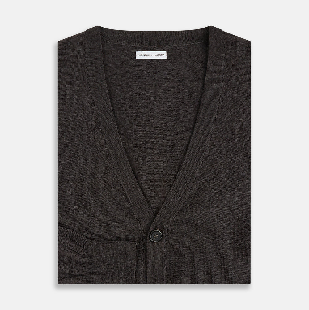 The Turnbull & Asser Brown Fine Merino V-Neck Cardigan is a classic, long-sleeved button-up knitwear piece, shown on a white background—a wardrobe essential.